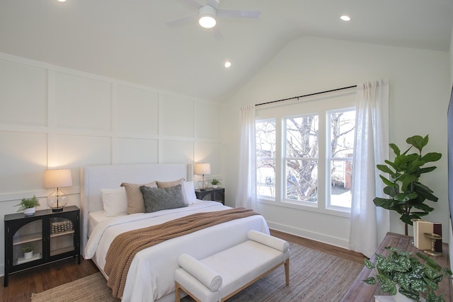 bedroom with dark hardwood / wood-style flooring, lofted ceiling, and ceiling fan