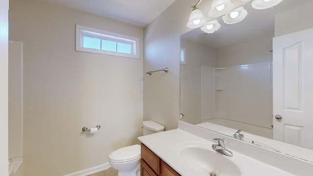 full bathroom with shower / tub combination, vanity, and toilet