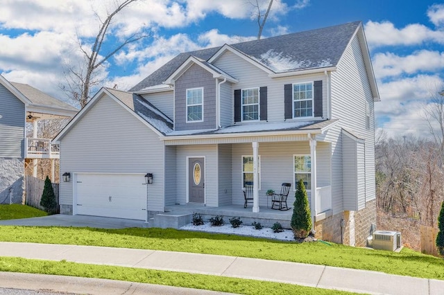 view of front of property featuring a porch, cooling unit, and a front yard