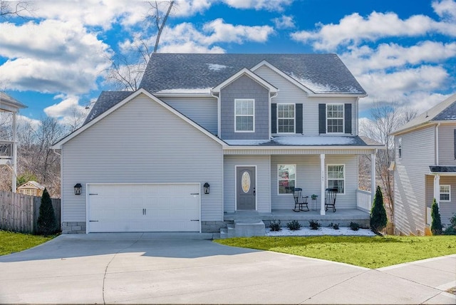 view of front of home featuring a front yard and a porch