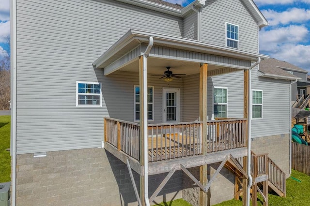 wooden deck with ceiling fan