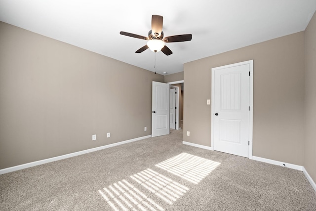 unfurnished bedroom with carpet and ceiling fan