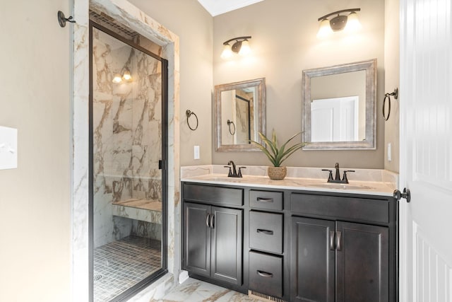 bathroom with vanity and a shower with shower door