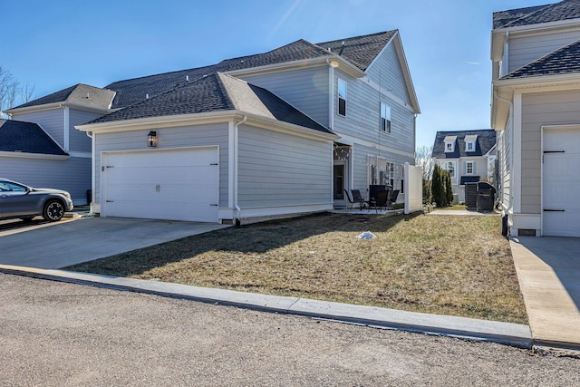 view of home's exterior with a garage and central AC unit