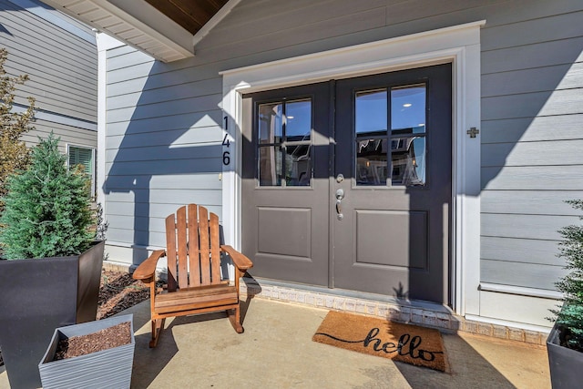 doorway to property featuring french doors