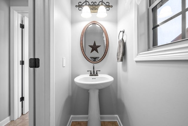 bathroom with tile patterned floors