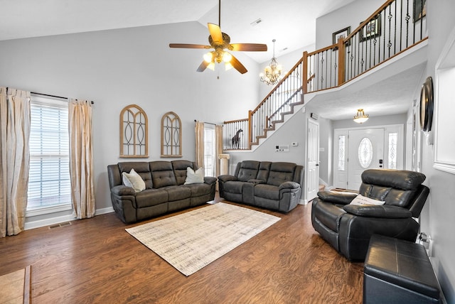 living room featuring high vaulted ceiling, dark hardwood / wood-style floors, and ceiling fan