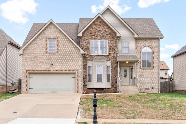 view of front facade featuring a garage and a front yard