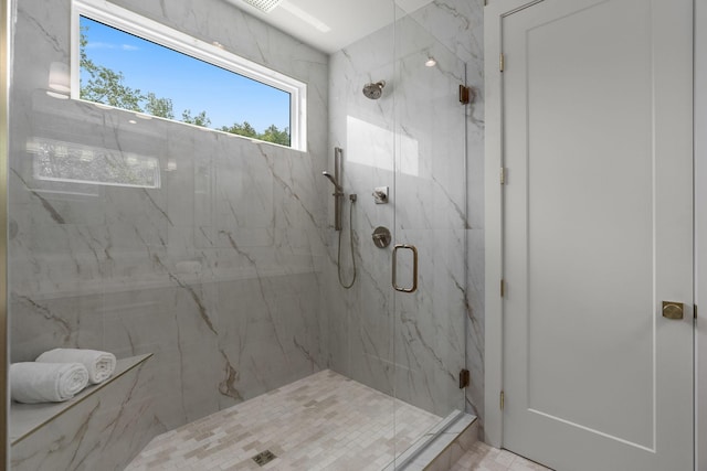 bathroom featuring an enclosed shower