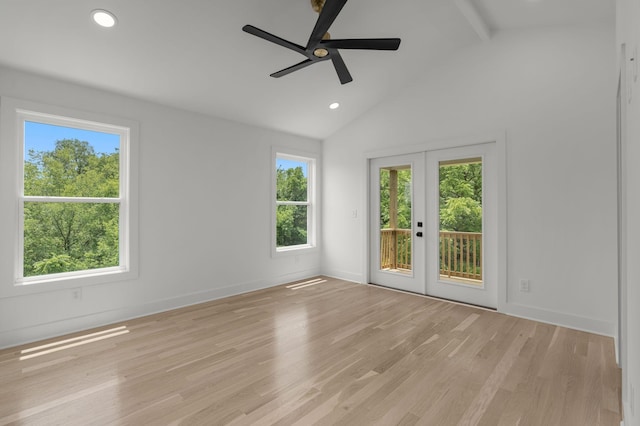 unfurnished room with vaulted ceiling with beams, light hardwood / wood-style flooring, french doors, and ceiling fan