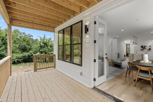 wooden deck featuring sink