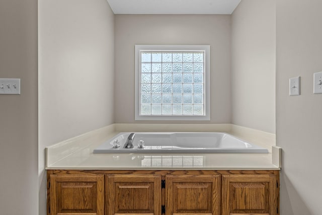 bathroom featuring a washtub