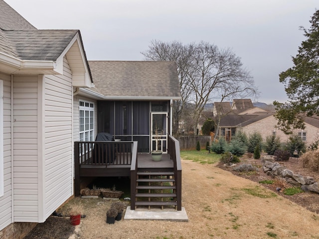 exterior space featuring a sunroom