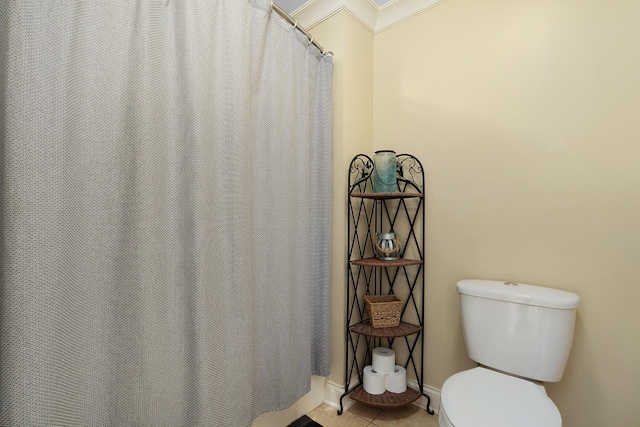 bathroom with walk in shower, ornamental molding, and toilet