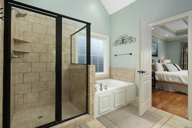 bathroom featuring ornamental molding, separate shower and tub, and tile patterned flooring