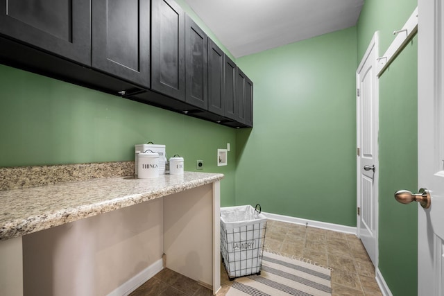 laundry area featuring cabinets, washer hookup, and hookup for an electric dryer