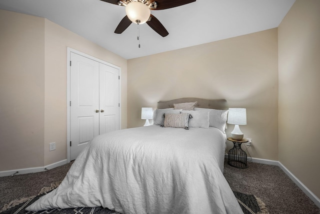 carpeted bedroom featuring ceiling fan and a closet