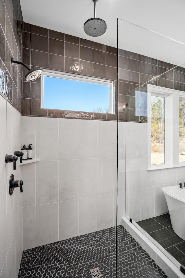 bathroom with separate shower and tub