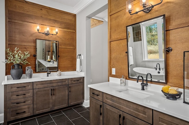 bathroom featuring wooden walls, a tub, tile patterned flooring, vanity, and crown molding