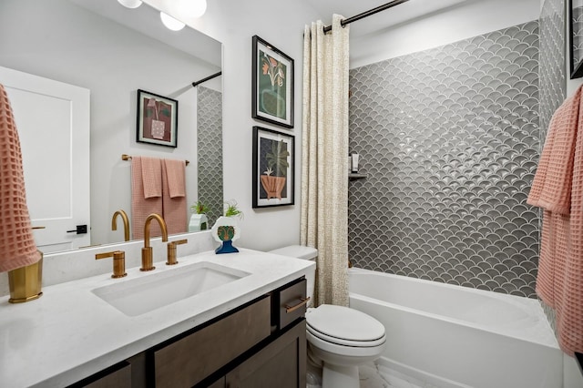 full bathroom featuring shower / tub combo with curtain, vanity, and toilet