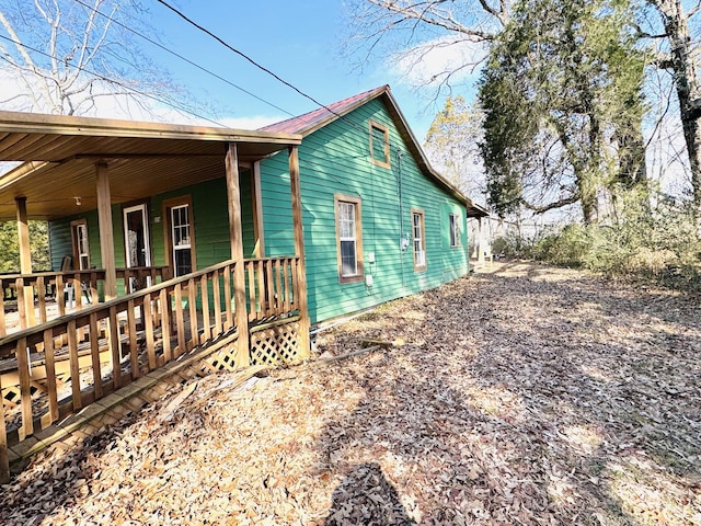 view of home's exterior with a porch