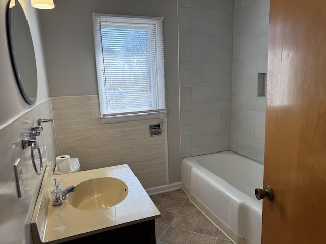 bathroom with vanity, tile walls, and tile patterned floors