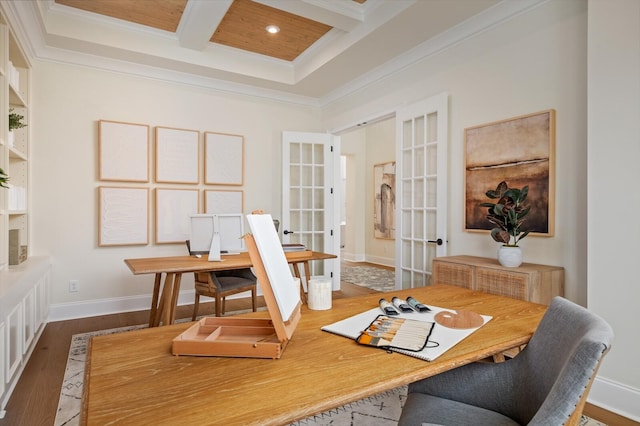 office area featuring crown molding, wood-type flooring, coffered ceiling, and beamed ceiling