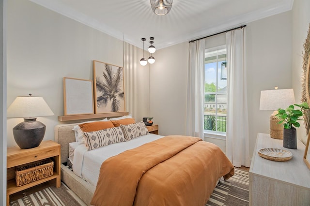 bedroom with crown molding