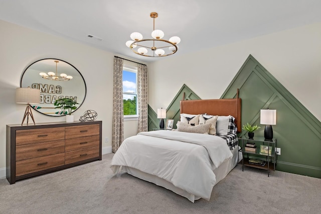 carpeted bedroom featuring a chandelier