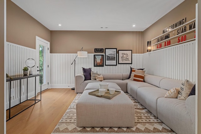 living room with light hardwood / wood-style floors