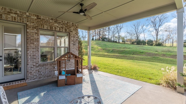 view of patio / terrace featuring ceiling fan