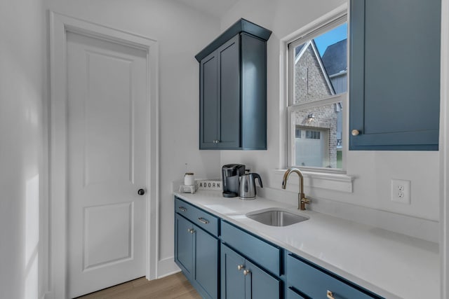 bathroom featuring vanity and hardwood / wood-style floors