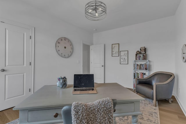 home office featuring light hardwood / wood-style flooring