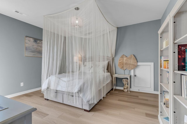 bedroom featuring light wood-type flooring