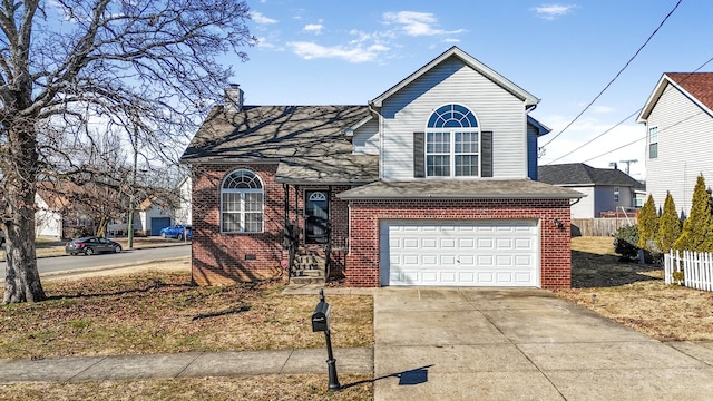 view of front of home with a garage