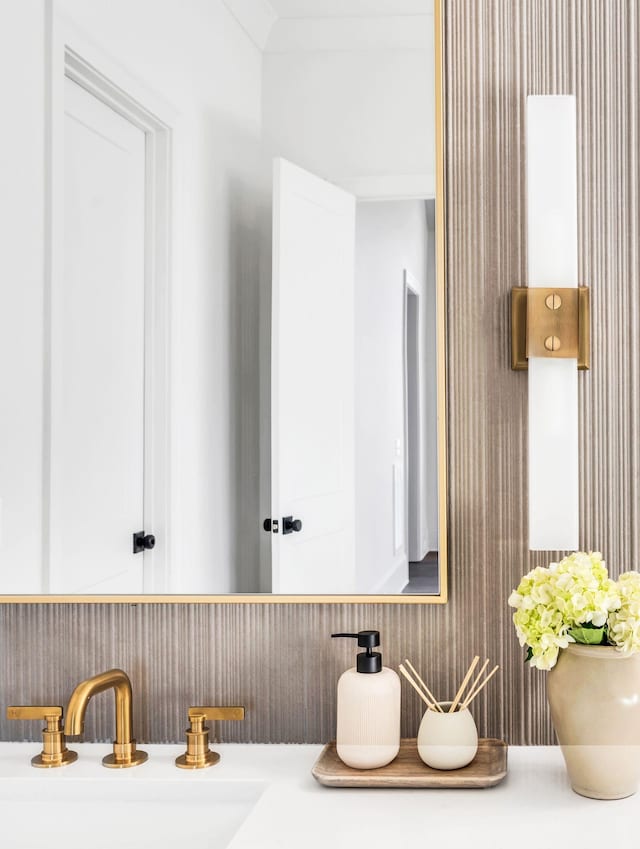 bathroom with vanity and backsplash