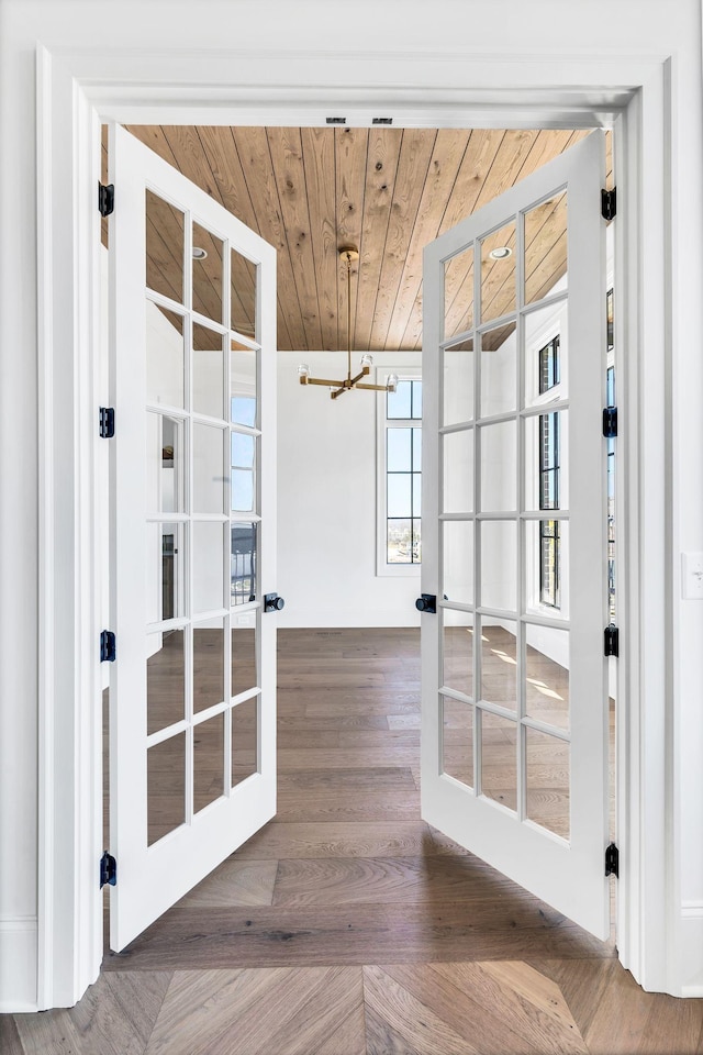 entryway featuring wooden ceiling and french doors