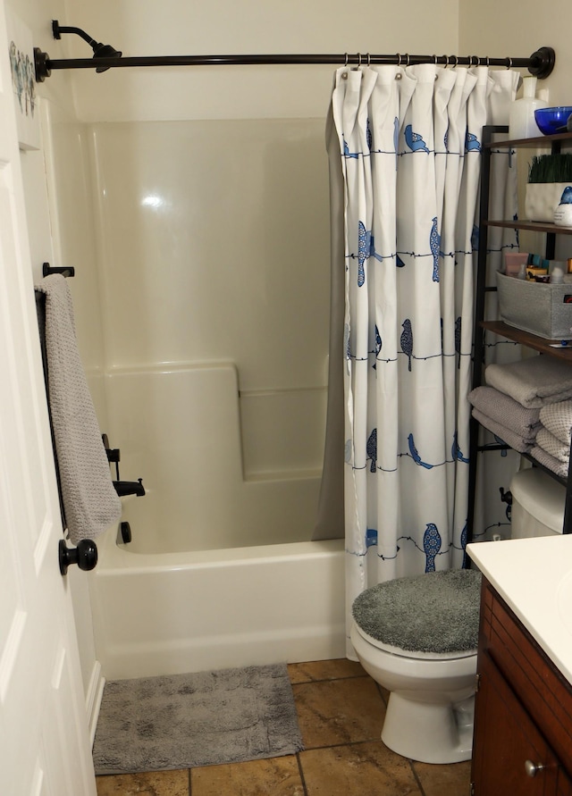 full bathroom with vanity, toilet, and shower / bath combo with shower curtain