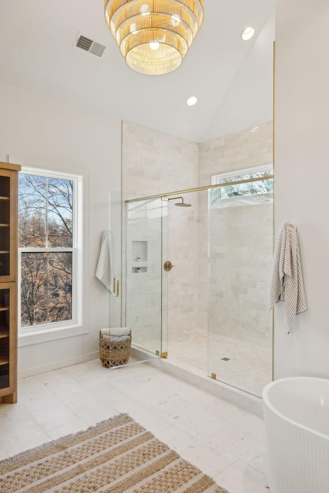 bathroom with vaulted ceiling and plus walk in shower