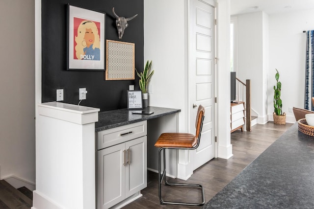 office space featuring dark wood-type flooring