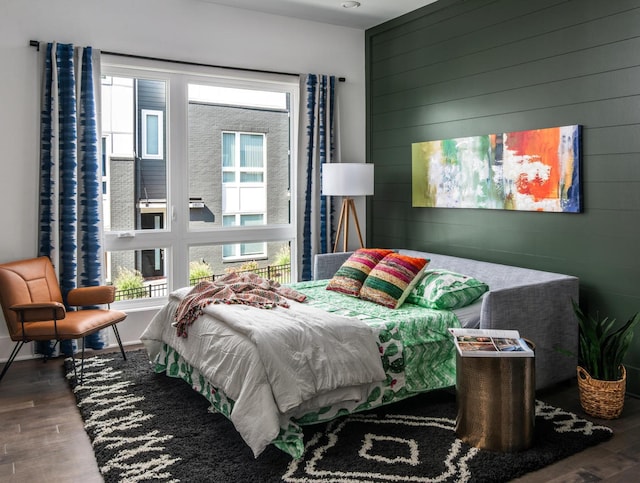 bedroom featuring dark hardwood / wood-style flooring