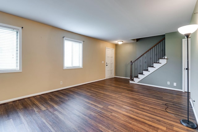 entryway with dark hardwood / wood-style floors