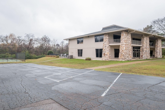 view of property with central air condition unit