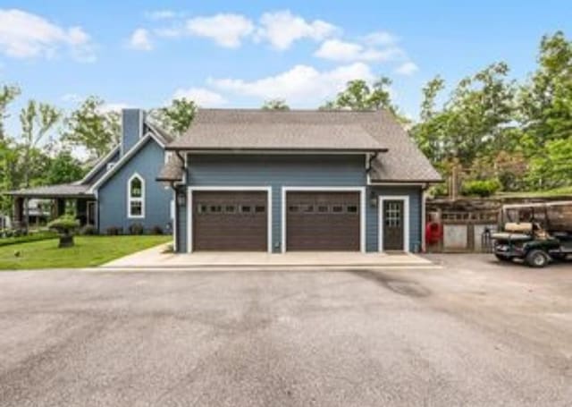 exterior space featuring a garage