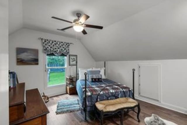 bedroom featuring vaulted ceiling, ceiling fan, and hardwood / wood-style floors