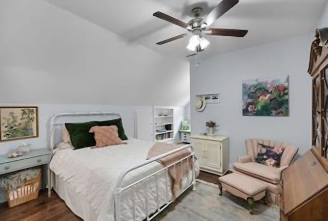 bedroom with dark hardwood / wood-style floors and ceiling fan