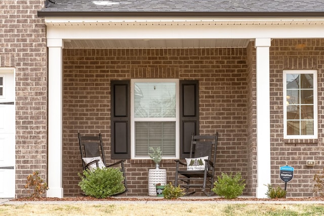 property entrance featuring covered porch