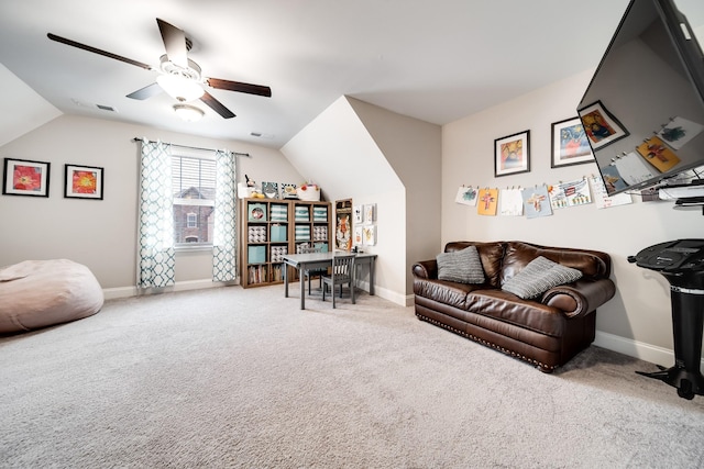 interior space with lofted ceiling, carpet floors, and ceiling fan