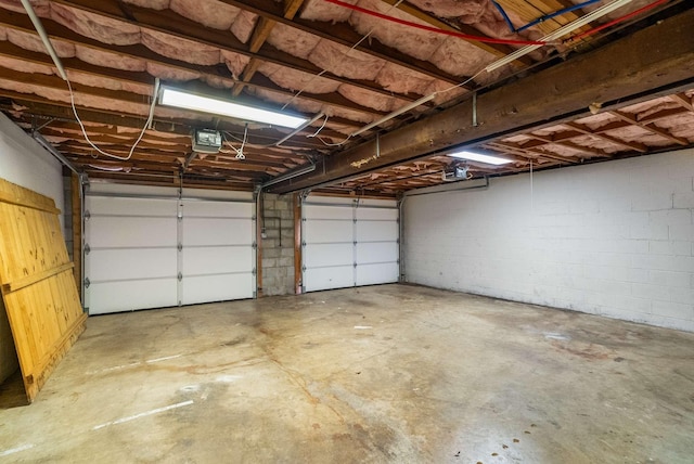 garage featuring a garage door opener