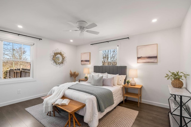 bedroom featuring dark wood-type flooring and ceiling fan